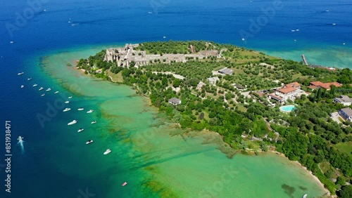 Sirmione Lake Garda Aerial View with Blue Water and Shoreline, Idyllic Summer Vacation Destination, Clear Sky and Historic Ruins Background