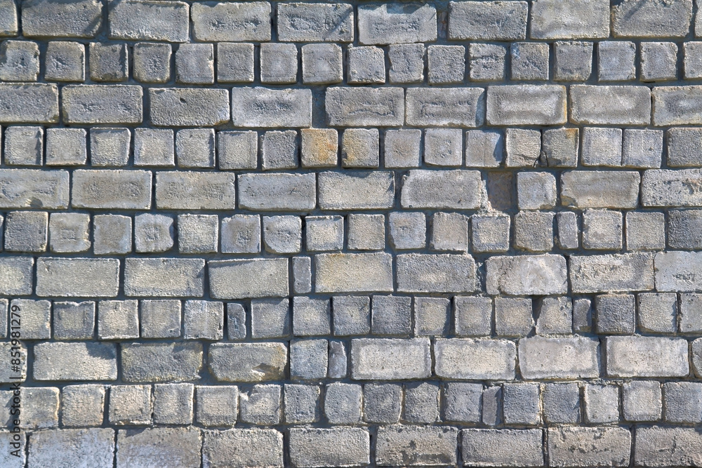 Old gray cement background with cinder block wall. Old gray cement background with cinder block wall.