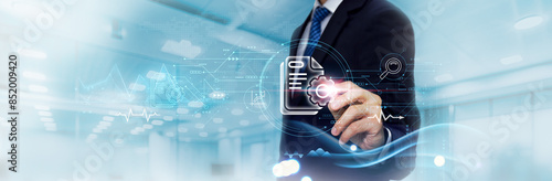 Project Management: Business Graph and Data of Strategic Business Growth, Planning, Coordination. Businessman Touches and Analyzes Data Growth of Projects, Efficiency, Execution, Success.