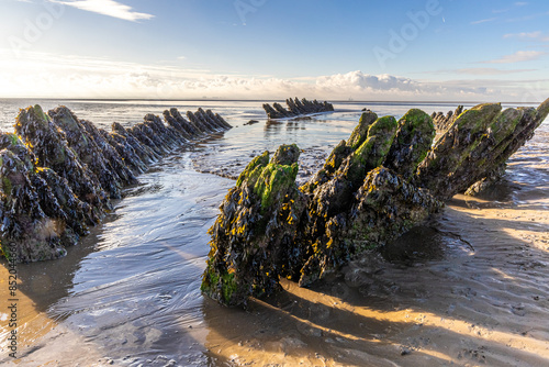 The wreck of the Norwegian ship SS Nornen which ran aground on the beach at Berrow near Burnham-on-Sea, UK in 1897 due to gale force winds