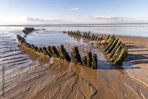 The wreck of the Norwegian ship SS Nornen which ran aground on the beach at Berrow near Burnham-on-Sea, UK in 1897 due to gale force winds photo