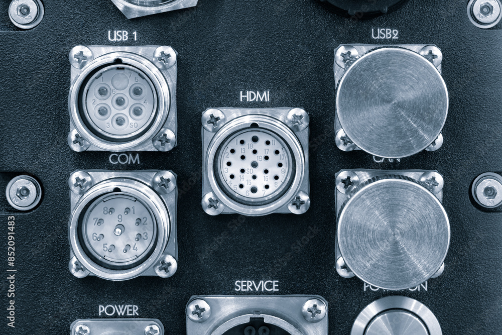 Panel with various electronic plugs for input and output signals, technology concept background