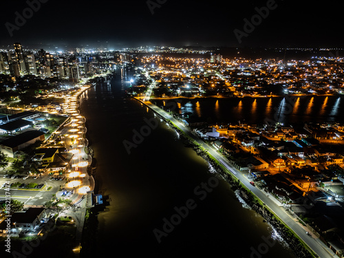 Night lights in Mampituba river photo