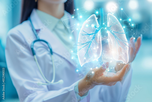 Woman doctor holds virtual lungs or lung hologram in hand close up, modern medicine technologies close up
