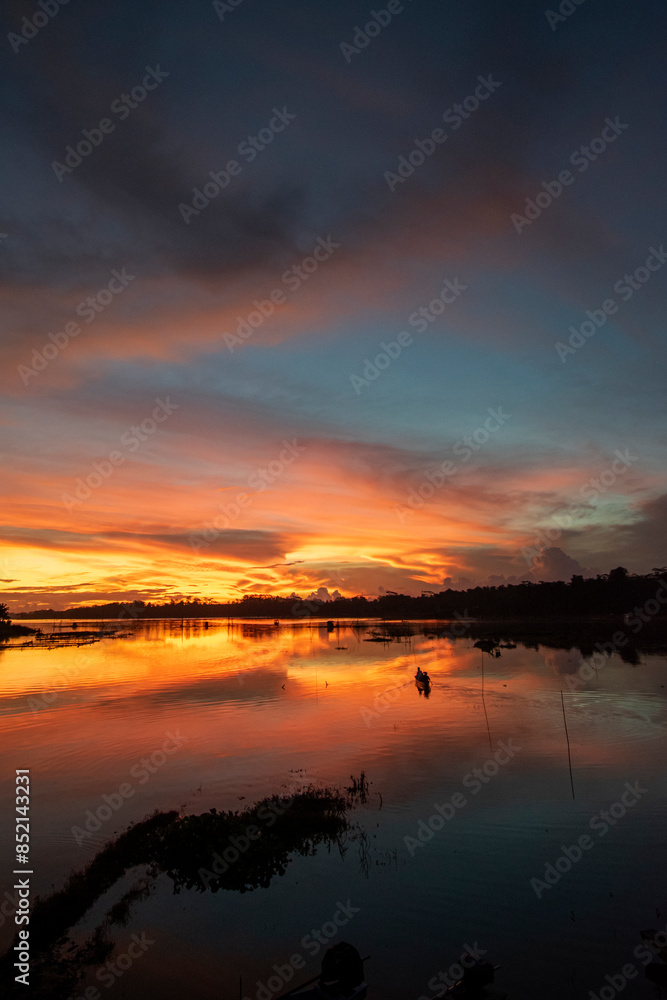 Beautiful sunset on the lake, beautiful view on the lake at dusk Beautiful sunset on the lake, beautiful view on the lake at dusk