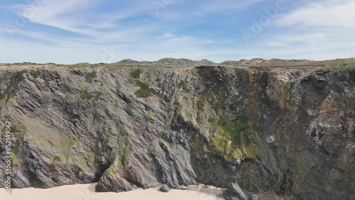 Majestic basalt rocks and high cliffs of western Portugal. Praia do Medo, Arrifana photo