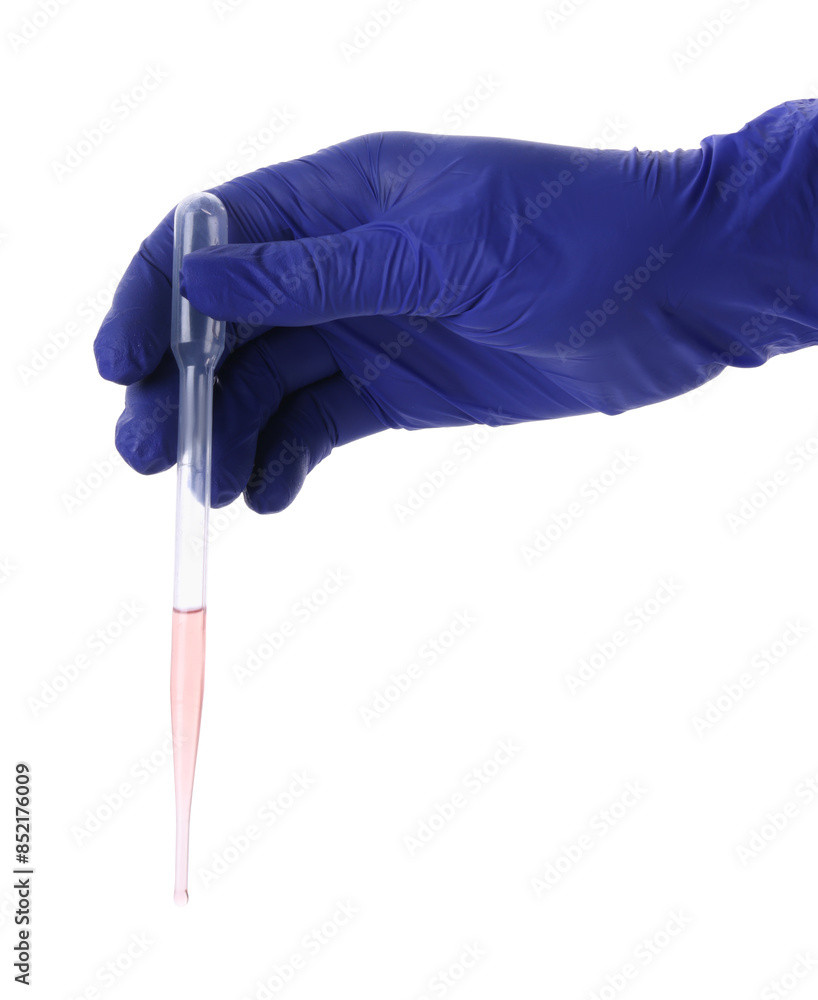 Scientist holding transfer pipette with liquid on white background, closeup Scientist holding transfer pipette with liquid on white background, closeup