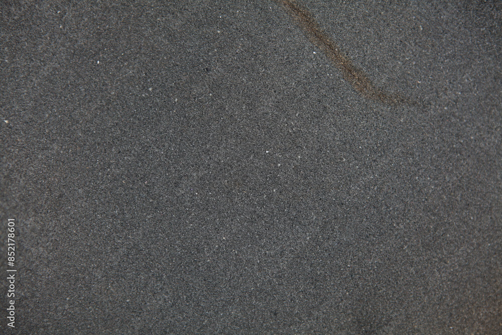 Smooth dark grey rock texture background Smooth dark grey rock texture background