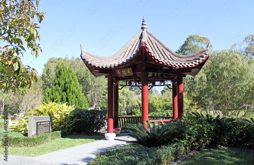 Chinese pavilion set amongst plants and trees at the Bundaberg Botanic Gardens in Queensland, Australia Chinese pavilion set amongst plants and trees at the Bundaberg Botanic Gardens in Queensland, Australia