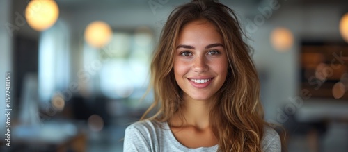 Smiling businesswoman standing in office