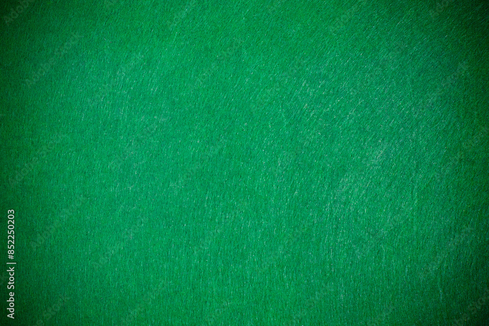 Fototapeta premium Green felt texture with vignette