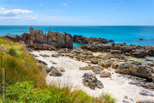 Obraz na płótnie Landscape Scenery of Mount Maunganui Beach, Tauranga - New Zealand; Rocky Part of the Beach w salonie