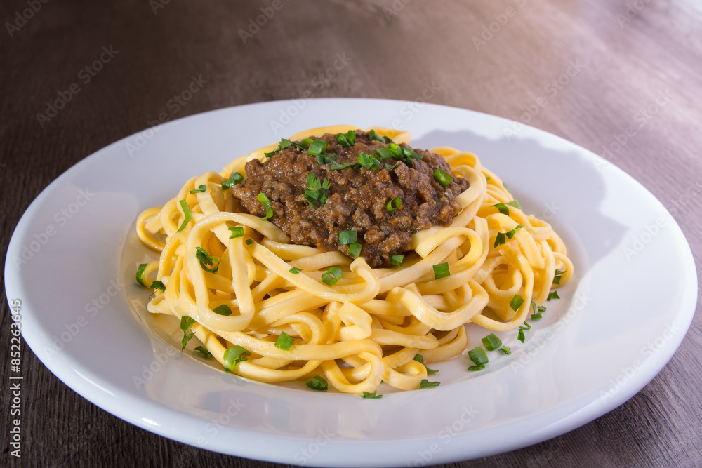 pasta dish with bolognese and sauce. pasta dish with bolognese and sauce.