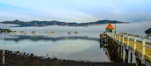 Obraz na płótnie Landscape Scenery of Akaroa Harbour, New Zealand in the Morning Misty Day w salonie