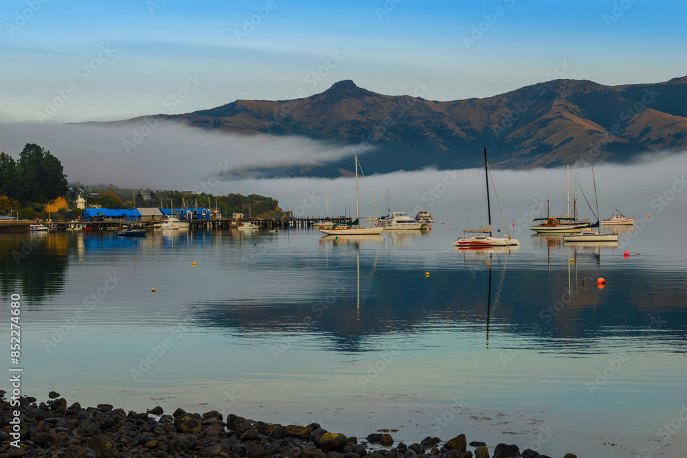 Landscape Scenery of Akaroa Harbour, New Zealand in the Morning Misty Day