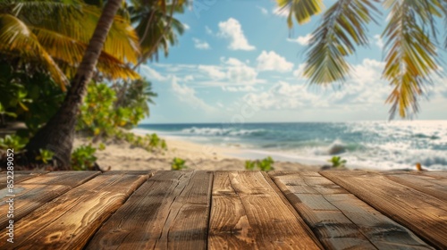 a close up of a wooden deck with a view of the ocean