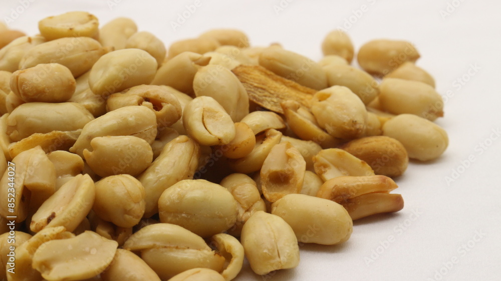 Delicious fried peanuts isolated Delicious fried peanuts isolated