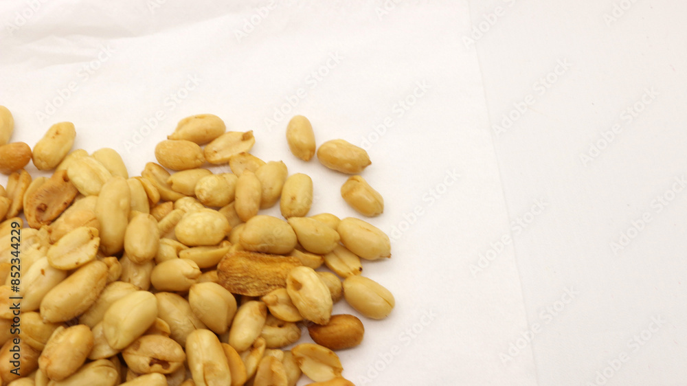 Delicious fried peanuts isolated Delicious fried peanuts isolated