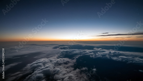 Panoramic view of clouds bathed in the golden light of the sunrise. bright blue sky