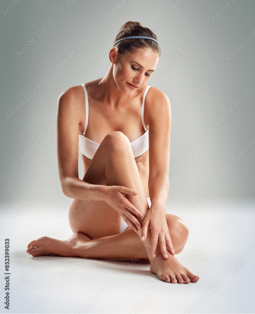 Girl, studio and legs with underwear for skincare or beauty, hair removal and epilation for smooth skin or self care. Woman, isolated and shine with wellness or natural cosmetic, treatment and happy. Girl, studio and legs with underwear for skincare or beauty, hair removal and epilation for smooth skin or self care. Woman, isolated and shine with wellness or natural cosmetic, treatment and happy.