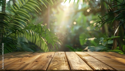 Fototapeta Naklejka Na Ścianę i Meble -  A wooden table with a view of a lush jungle