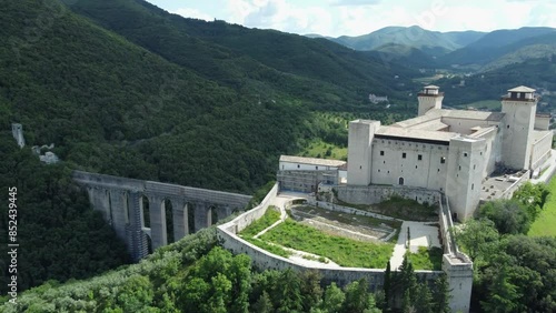 4K aerial footage of the Rocca Albornoziana in Spoleto, which is is a city in Umbria, Italy photo