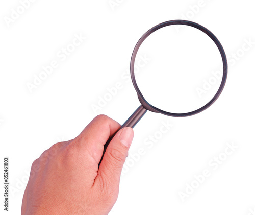 A hand holding a magnifying glass with a transparent magnification lens glass. PNG background cutout.