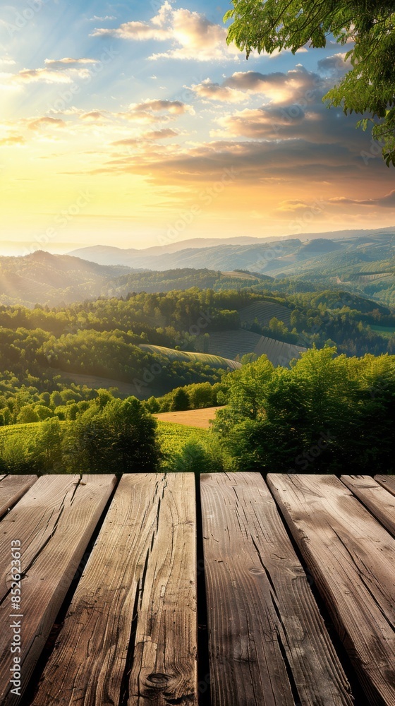 Wooden deck overlooking a lush valley at sunset Wooden deck overlooking a lush valley at sunset