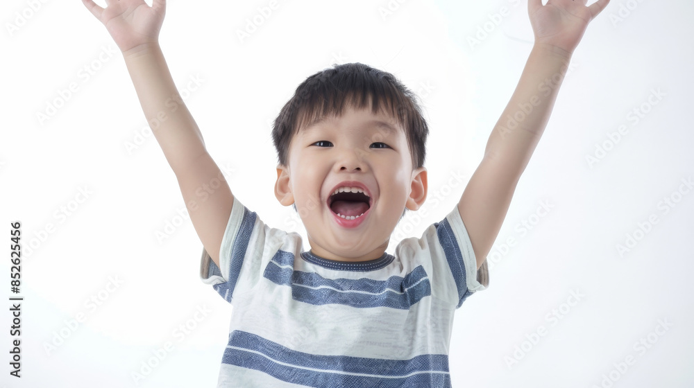 A joyful child with arms raised high, mouth open wide in a jubilant expression, against a clean white background. A joyful child with arms raised high, mouth open wide in a jubilant expression, against a clean white background.