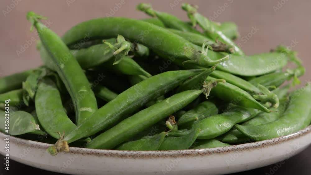 green peas pods heap close up food rotation green peas pods heap close up food rotation