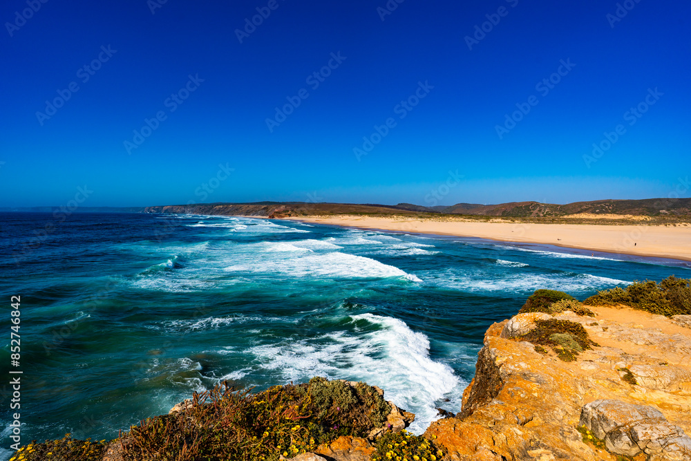 Sandy beach and blue sky Portugal, Algarve, Bordeira praia Sandy beach and blue sky Portugal, Algarve, Bordeira praia