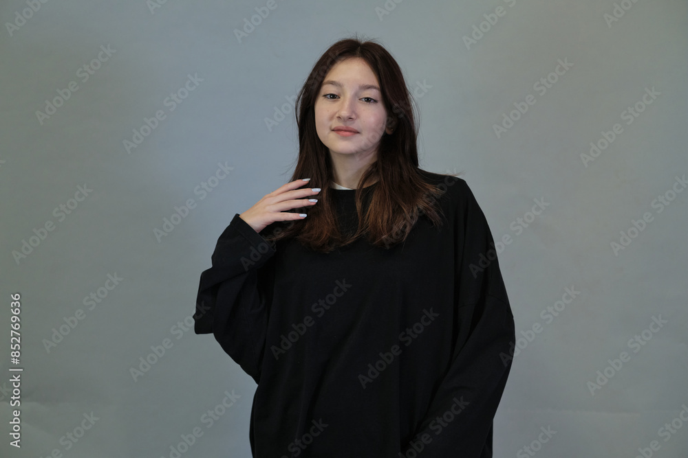 Intimate gesture of hair twirling, conveys the universal habit of pondering life's questions. Intimate gesture of hair twirling, conveys the universal habit of pondering life's questions.