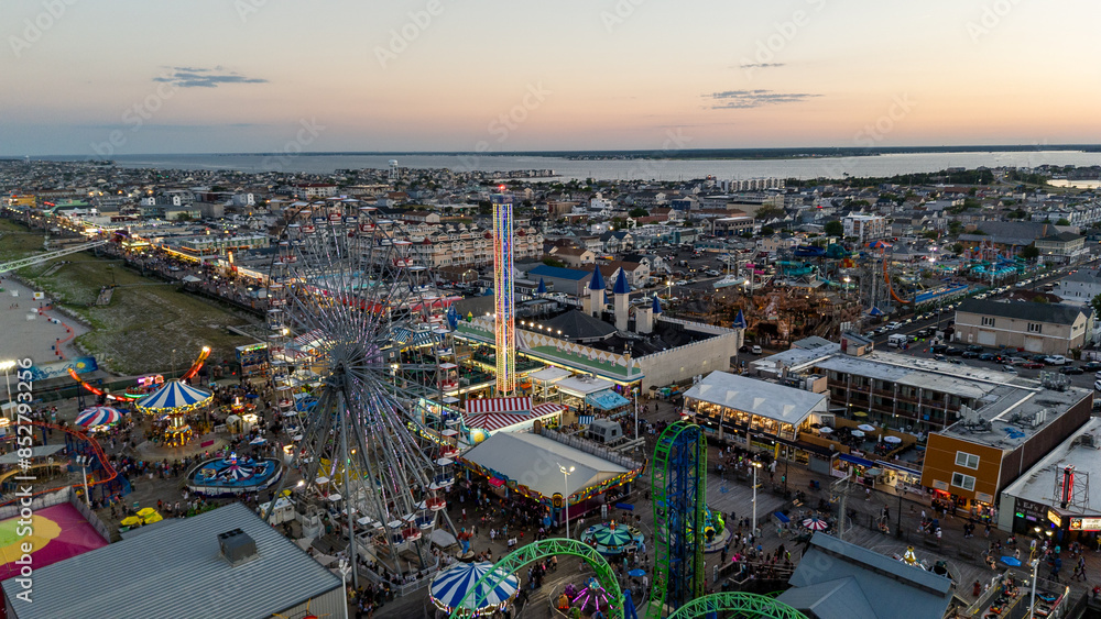 Fototapeta premium Aerial drone of Seaside Heights Boardwalk sunset