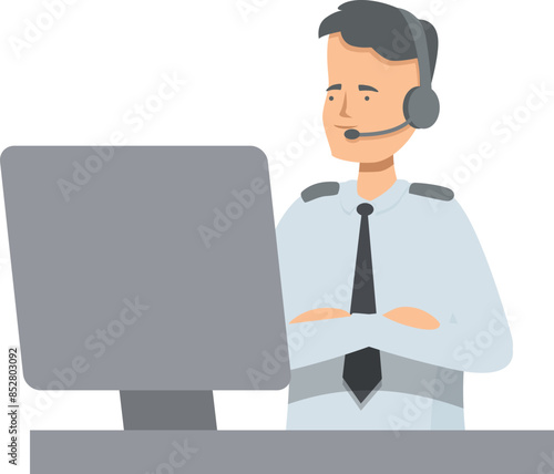 Airline dispatcher wearing headset sitting at desk working on a computer at the airport