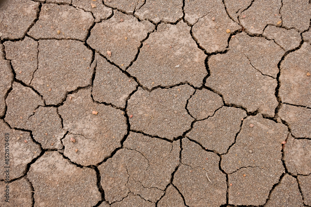 Wall texture soil dry crack pattern of drought lack of water of nature brown old broken background. Wall texture soil dry crack pattern of drought lack of water of nature brown old broken background.