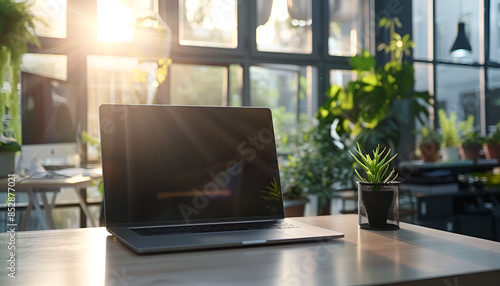 Wallpaper Mural Openned Laptop on a Desk in a Modern Office. Sunlight Streams Through Windows Torontodigital.ca