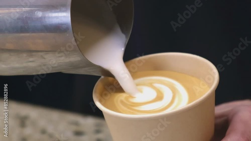 Latte preparation. Making coffee. Barista preparing coffee. Latte art.