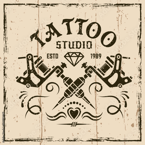 Tattoo studio vector emblem in vintage style on background with grunge textures