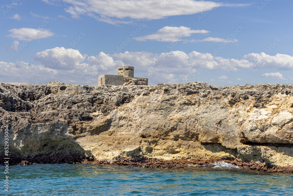 Military bunker from World War II on picturesque coastline of Adriatic Sea, Polignano a Mare, Italy, Apulia
