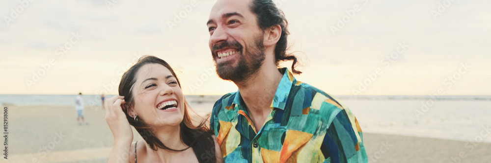 Happy couple in love standing on the coast, close-up, panorama Happy couple in love standing on the coast, close-up, panorama