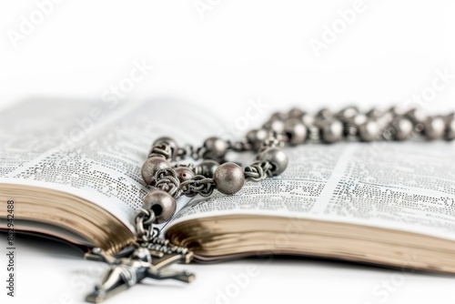 Rosary, bible, open book, or faith study with holy spiritual scripture for religion or mindfulness. Christian literature, background, or story for God or Jesus Christ education. photo