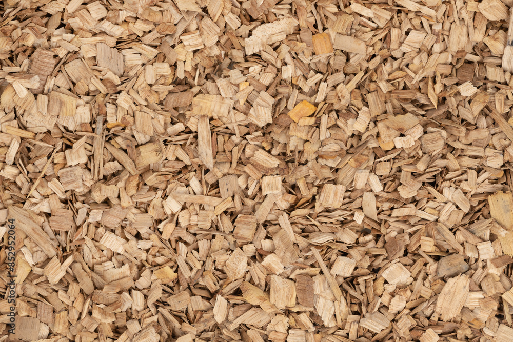 Wooden chips texture background. small wood chips for smoking. sawdust texture. ecological fue Wooden chips texture background. small wood chips for smoking. sawdust texture. ecological fue