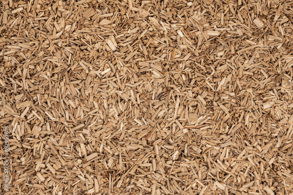 Wooden chips texture background. small wood chips for smoking. sawdust texture. ecological fue Wooden chips texture background. small wood chips for smoking. sawdust texture. ecological fue