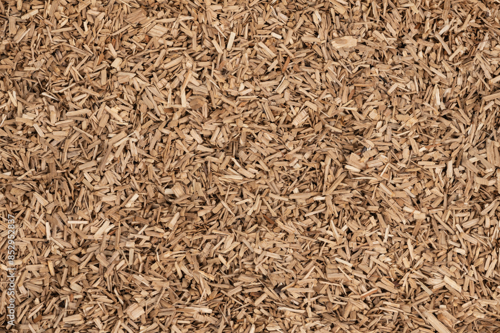 Wooden chips texture background. small wood chips for smoking. sawdust texture. ecological fue Wooden chips texture background. small wood chips for smoking. sawdust texture. ecological fue