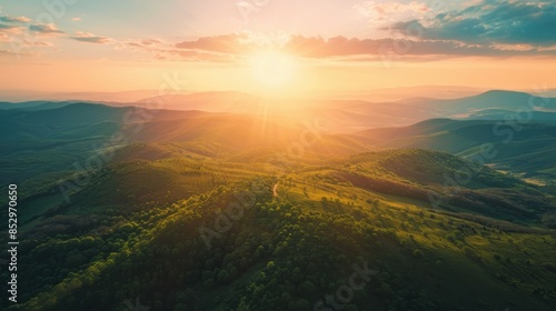 Wallpaper Mural photo of green mountains from above in warm colors at sunrise. Torontodigital.ca