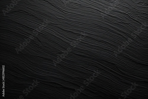 Depth in Darkness: Abstract Background with Carbon Fiber Texture