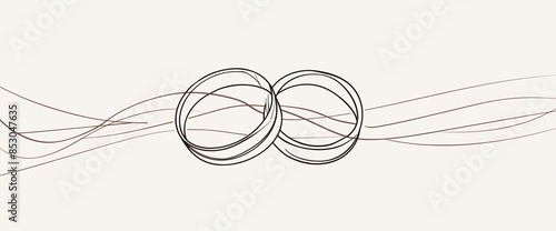 deux anneaux alliances, entrelacés symbolisant l'union et l'éternité, le mariage sur un fond sobre avec des lignes fluides.