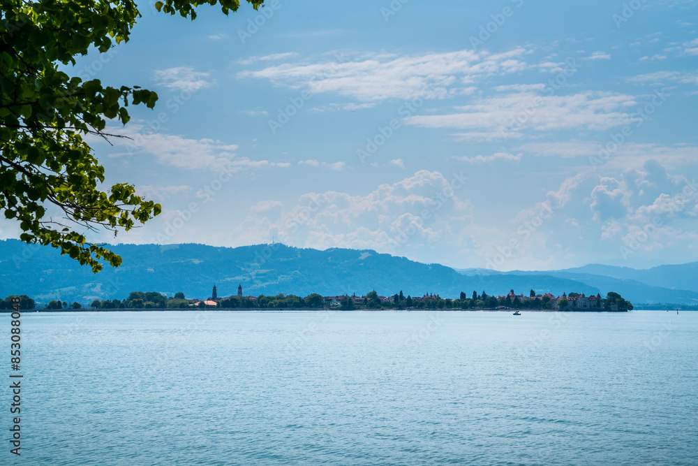 Germany, Lindau island city from lindenhofpark nature city park at bodensee lake constance water in summer with blue sky