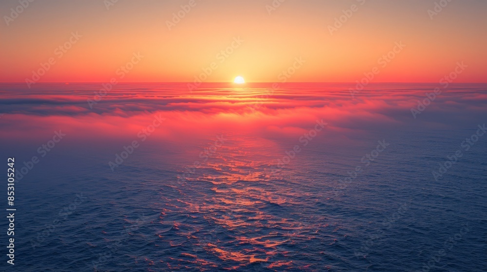 Fototapeta premium sunset sunrise over blue ocean with orange yellow red purple gradient clouds aerial photography scenic view