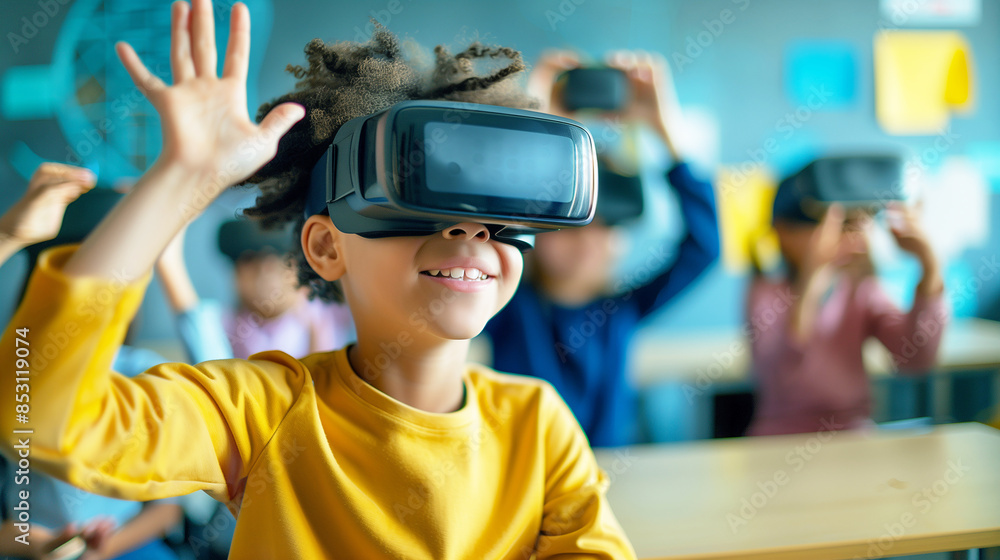 Young student in a classroom excitedly using virtual reality goggles ...